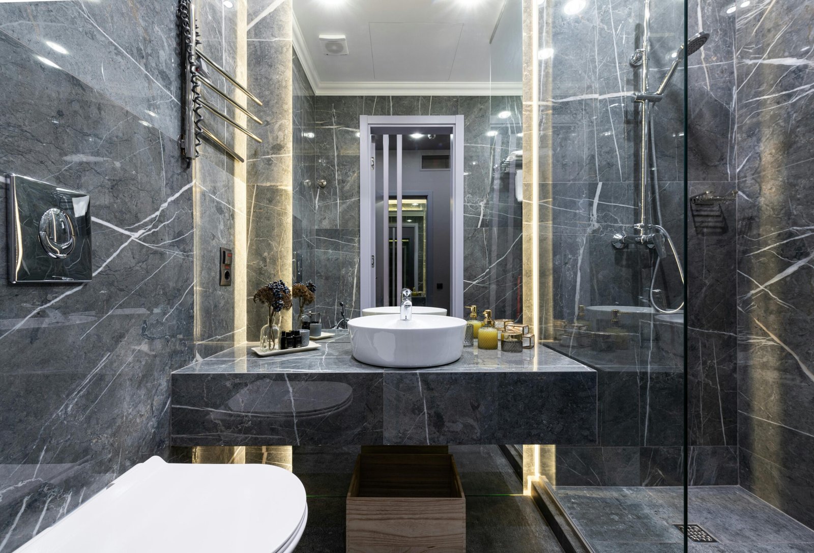 Downtown Vancouver bathroom tile installation with glass shower and porcelain flooring
