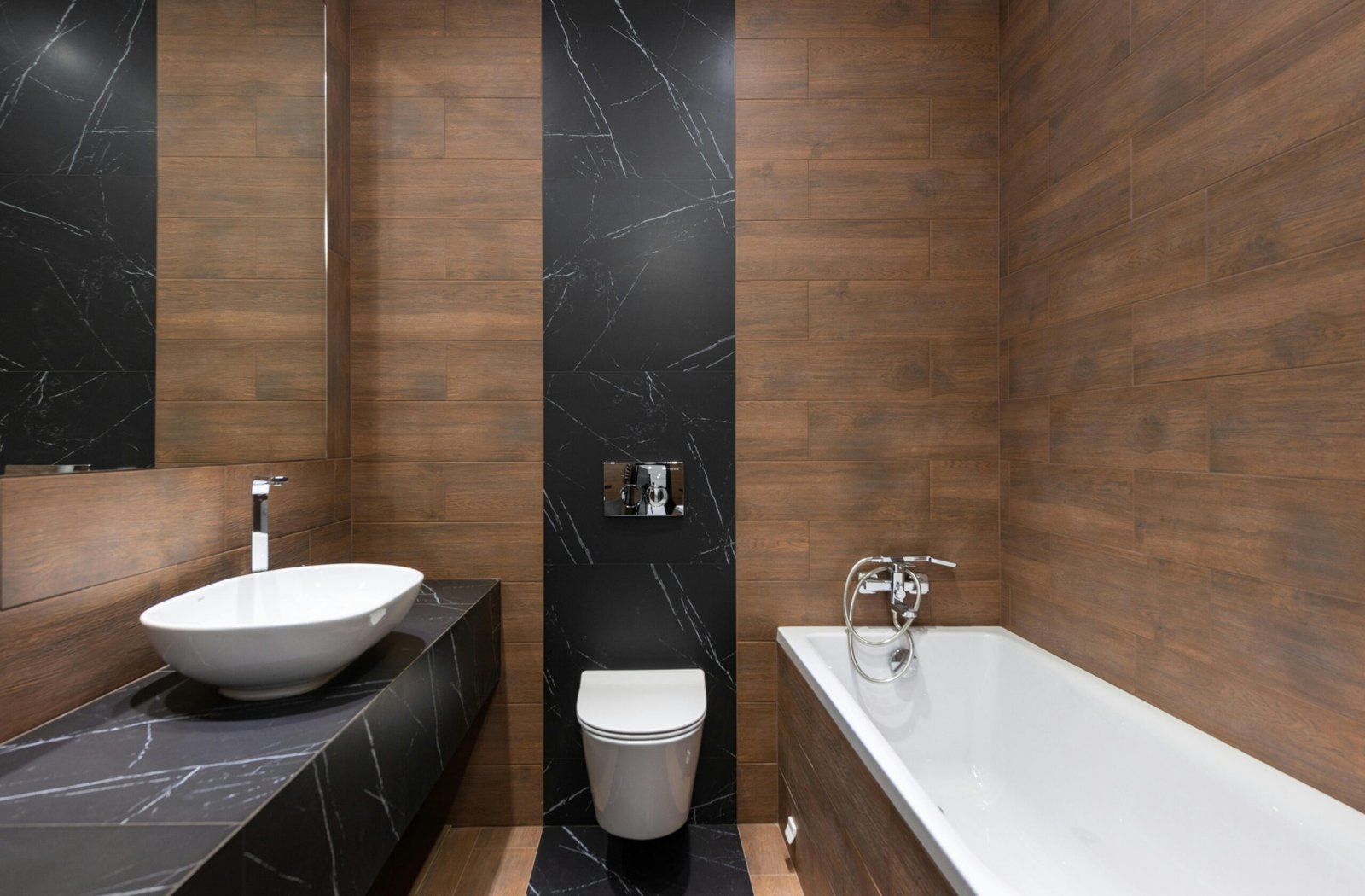 Burnaby bathroom renovation featuring large-format wall tiles and precision grout lines