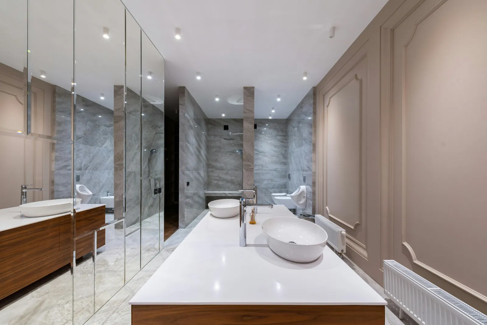 Modern bathroom with large-format Dekton walls and vanity