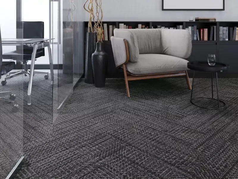 Dark charcoal commercial carpet tile flooring installed in a modern office setting in Vancouver BC